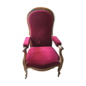 Voltaire armchair with red velvet wheels