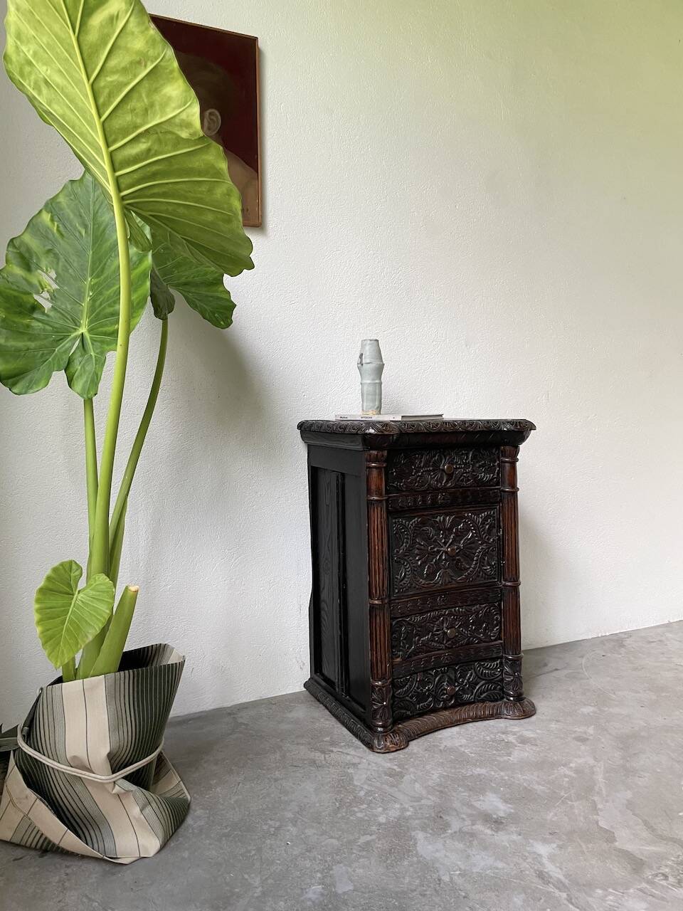 19th century chest of drawers in carved blackened pine