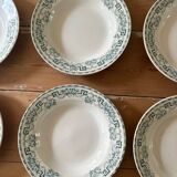 Set of eight Moulin des loups soup plates