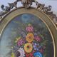 Painted under glass convex medallion in bronze