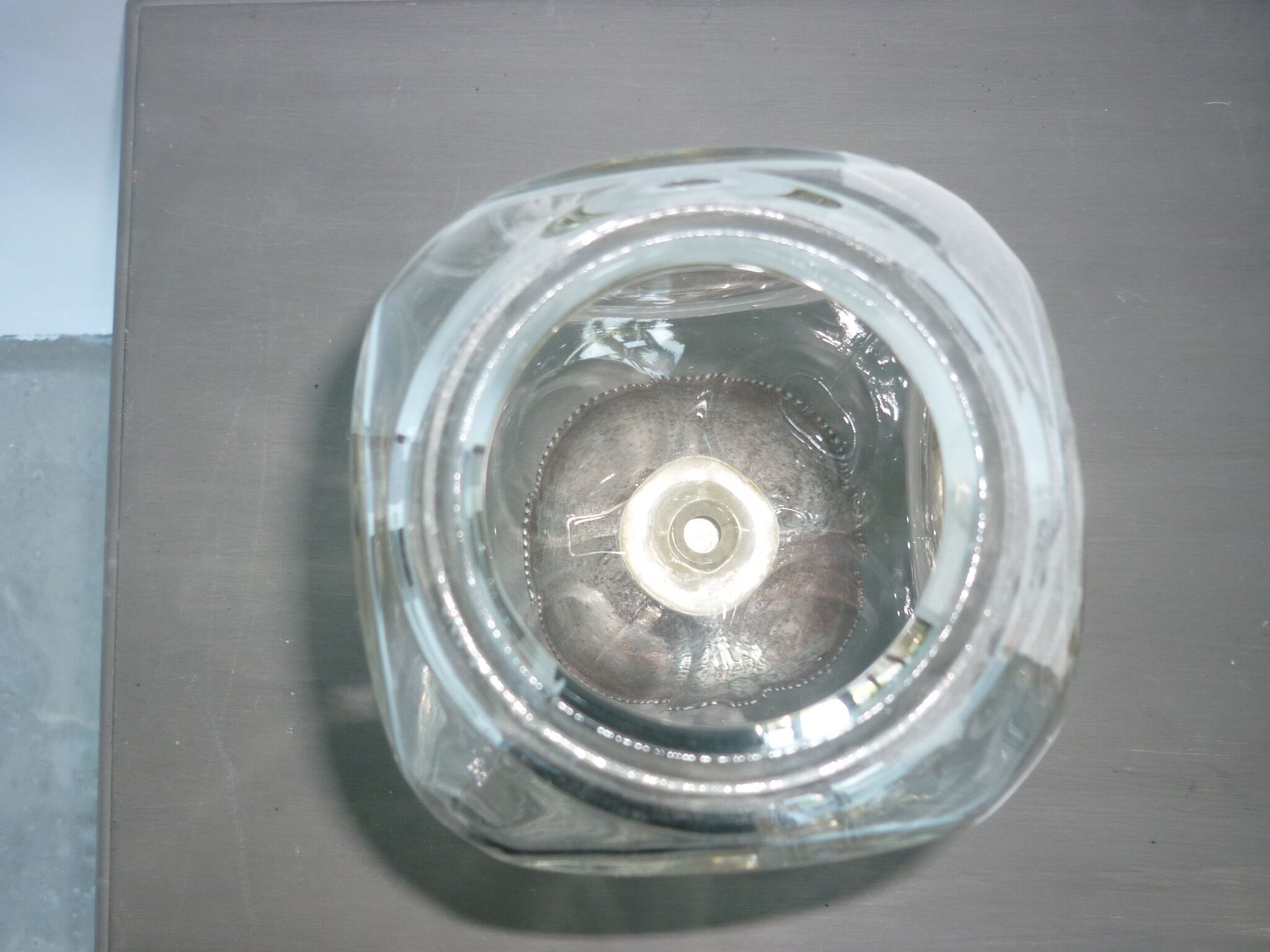 Vase or glass cup on silver stand