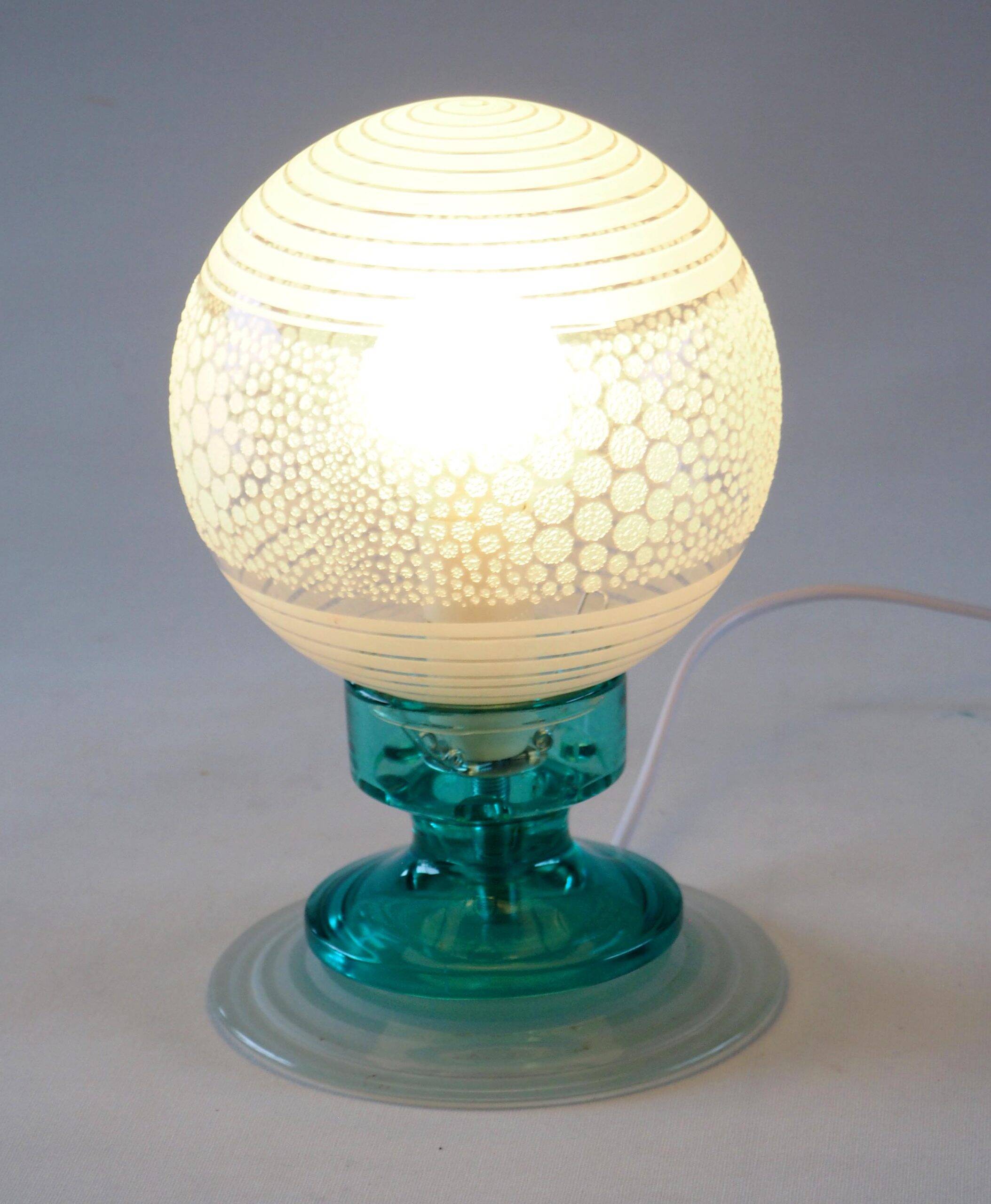 Frosted globe lamp and turquoise glass