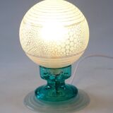 Frosted globe lamp and turquoise glass