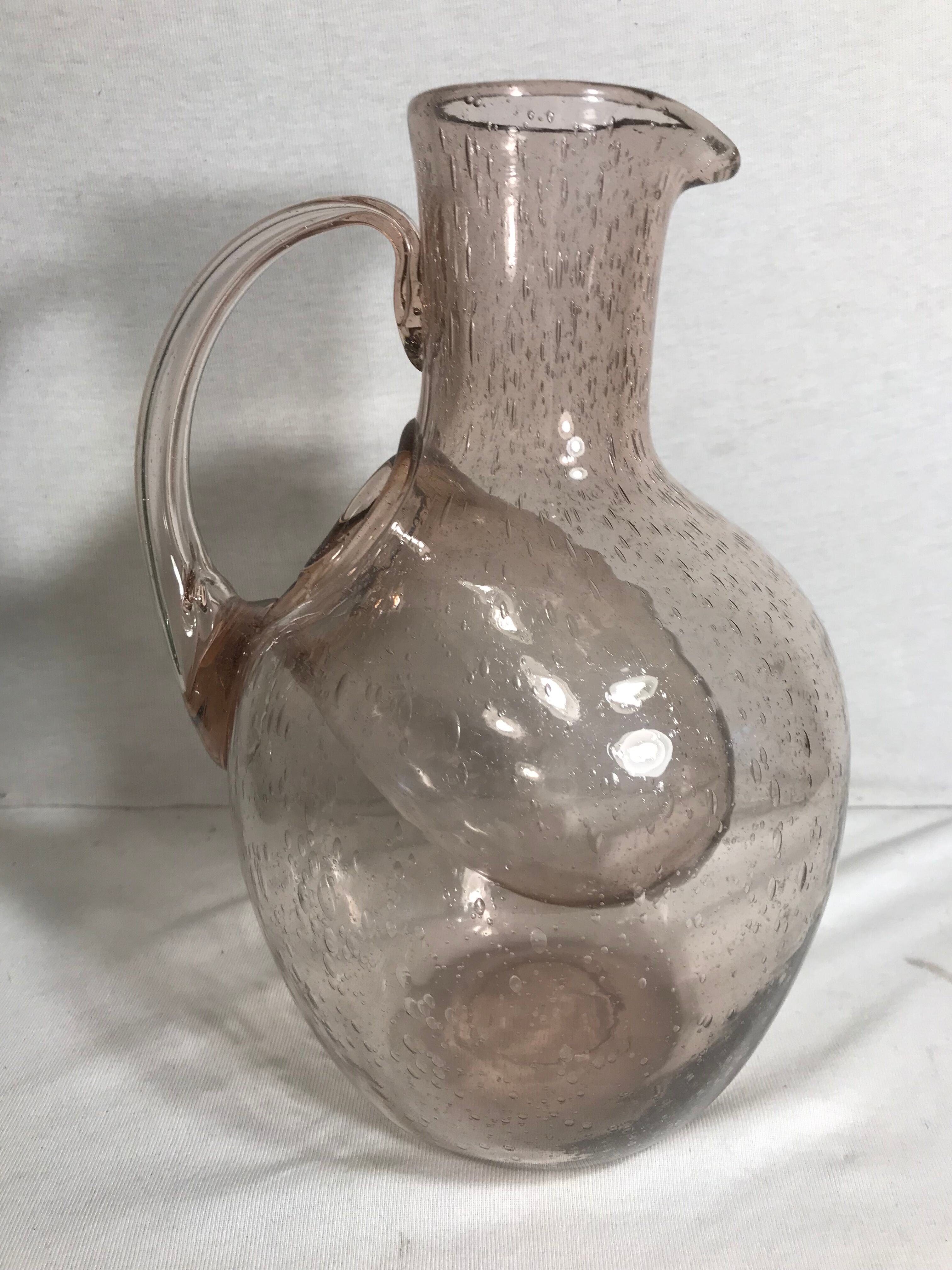 Bubble blown glass jug