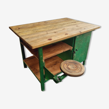 Old workbench kitchen island with swivel stool grass green