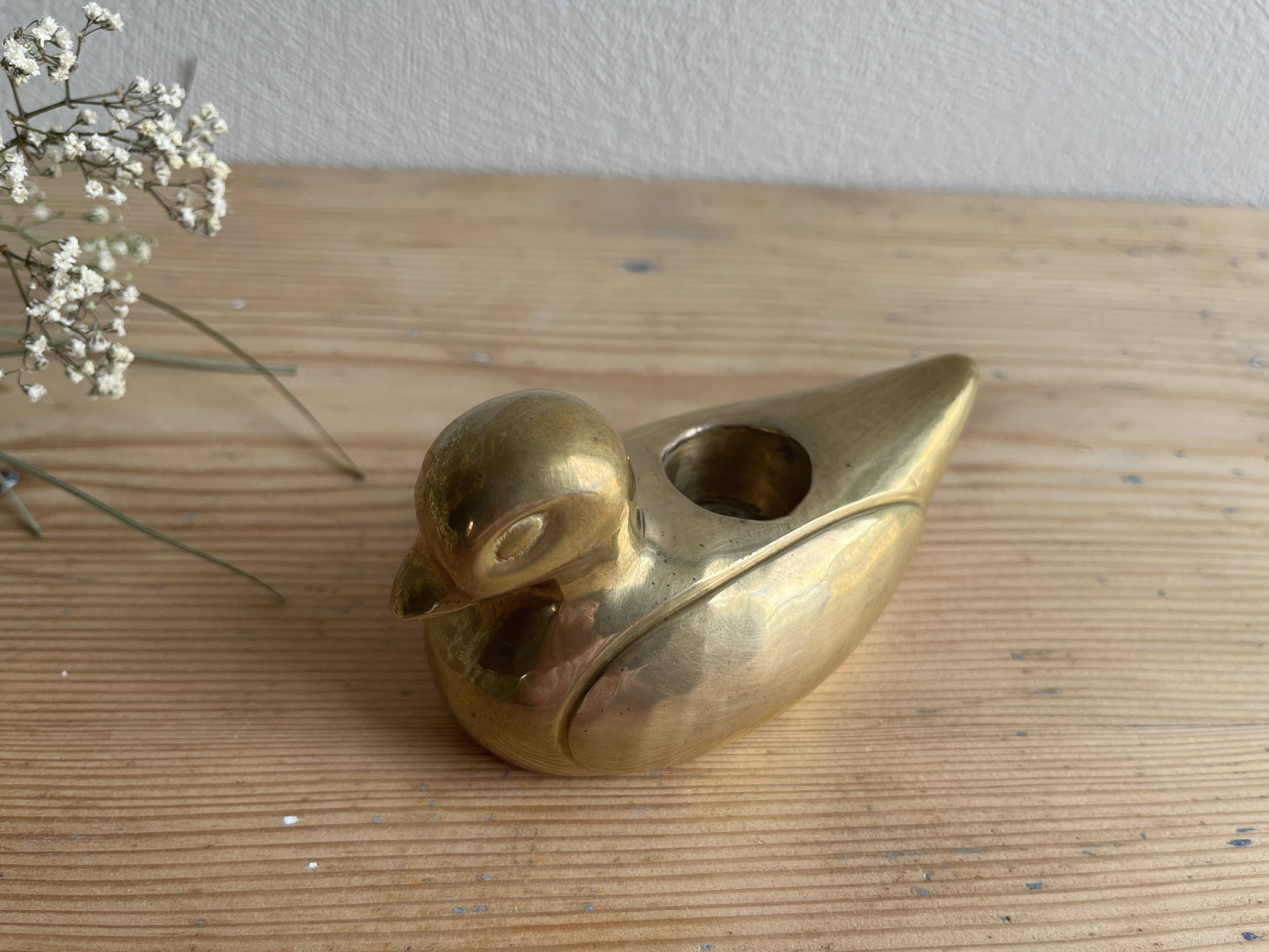 Brass duck candle holder