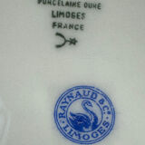 Shallow porcelain plate from Limoges Raynaud, bird decoration.