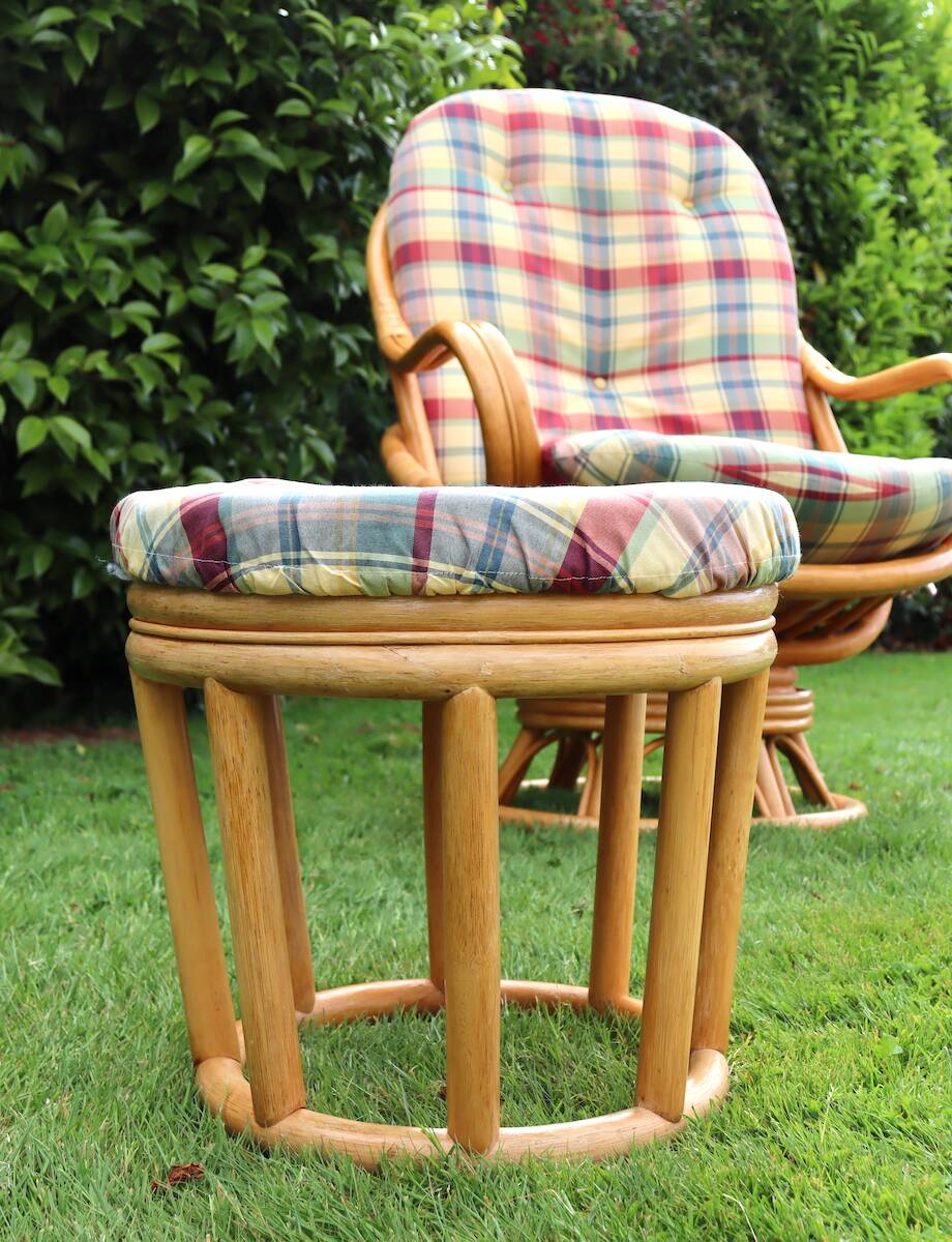 Swivel rattan armchair with matching ottoman