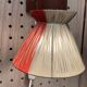 Scandinavian design wall light in teak and brass from the 1950s.