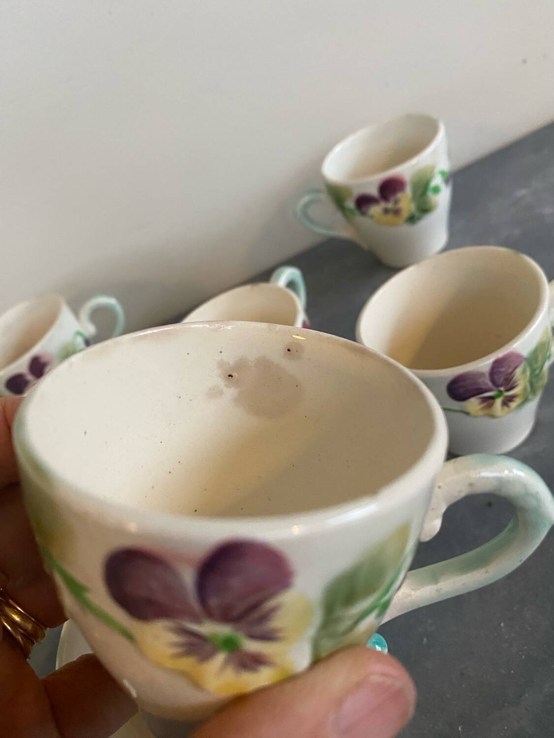 10 slipware cups, pansies