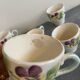 10 slipware cups, pansies