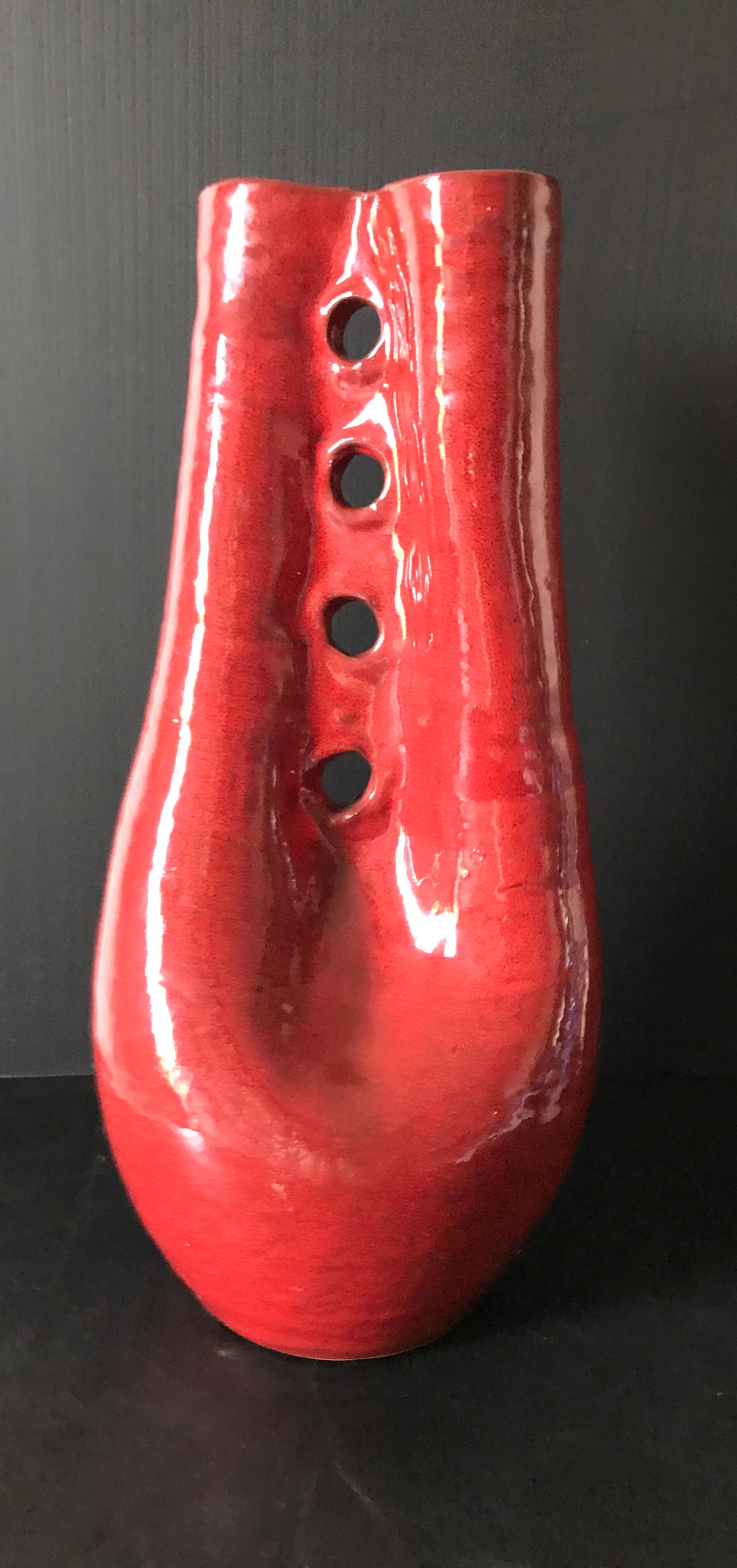 Red ceramic vase