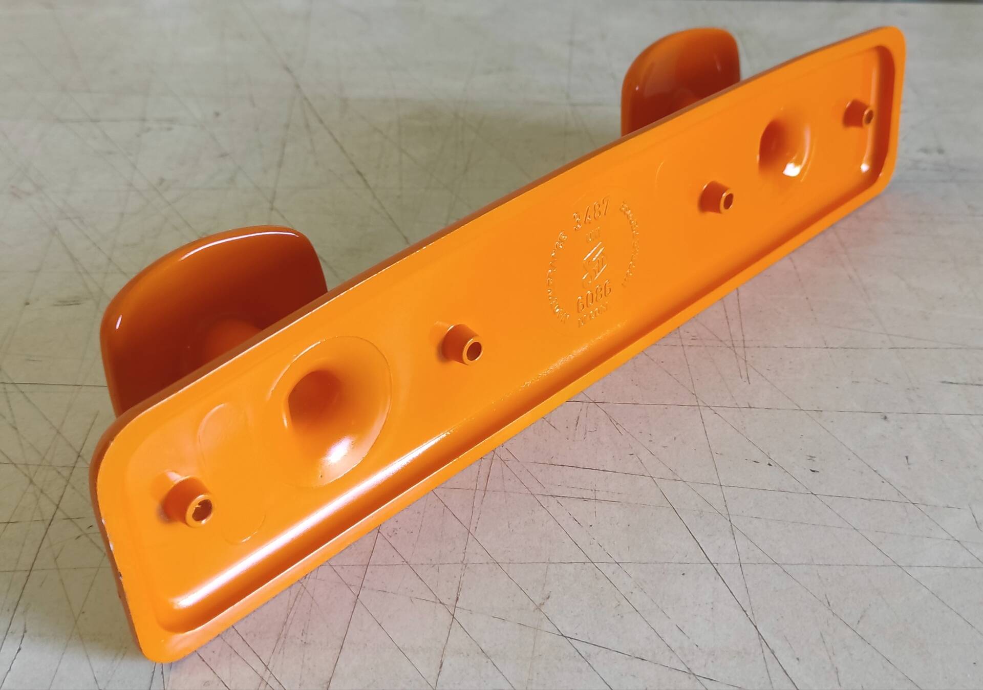 Orange plastic coat rack by Syla - 70's