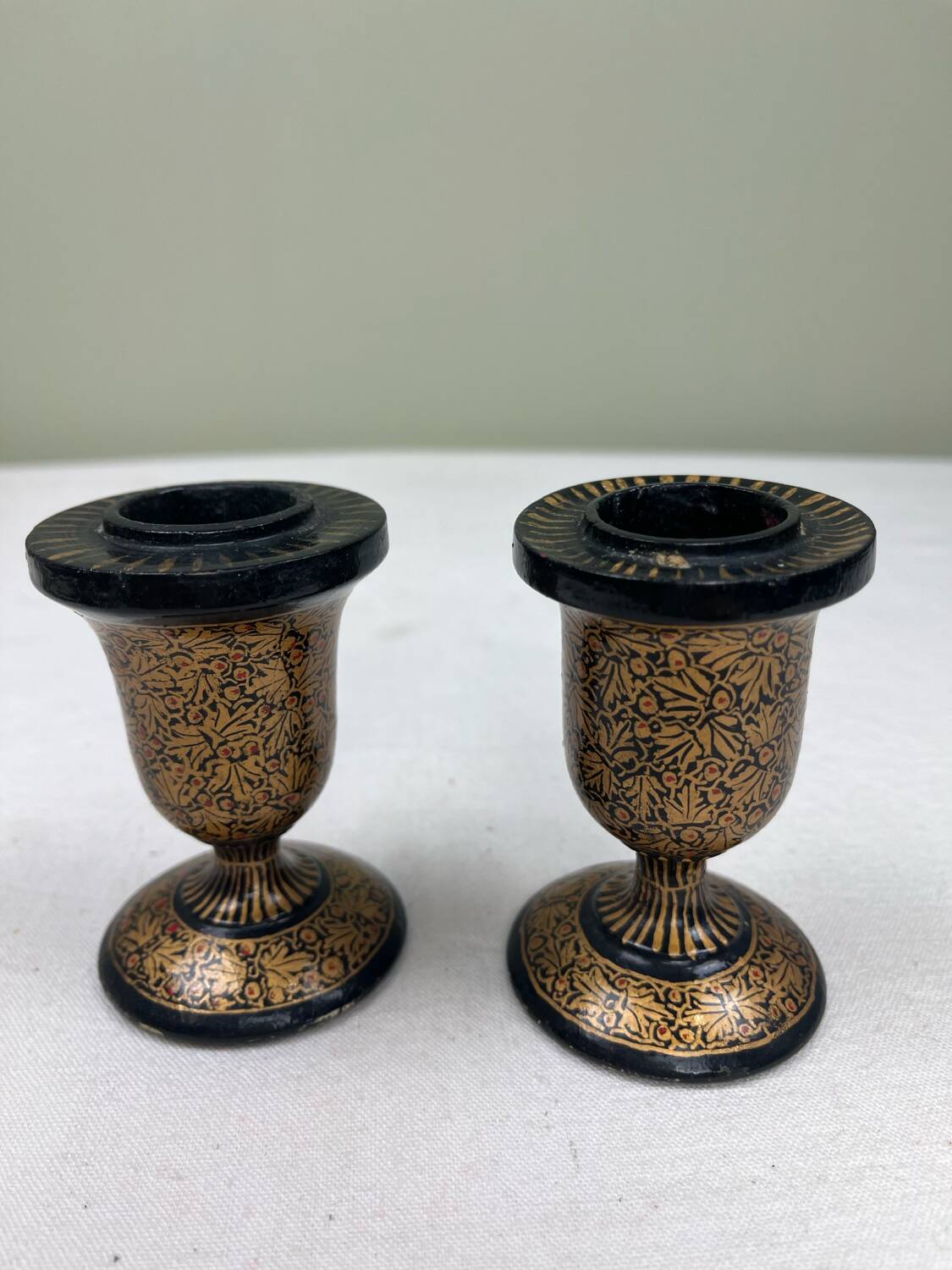Pair of lacquered wooden candlesticks