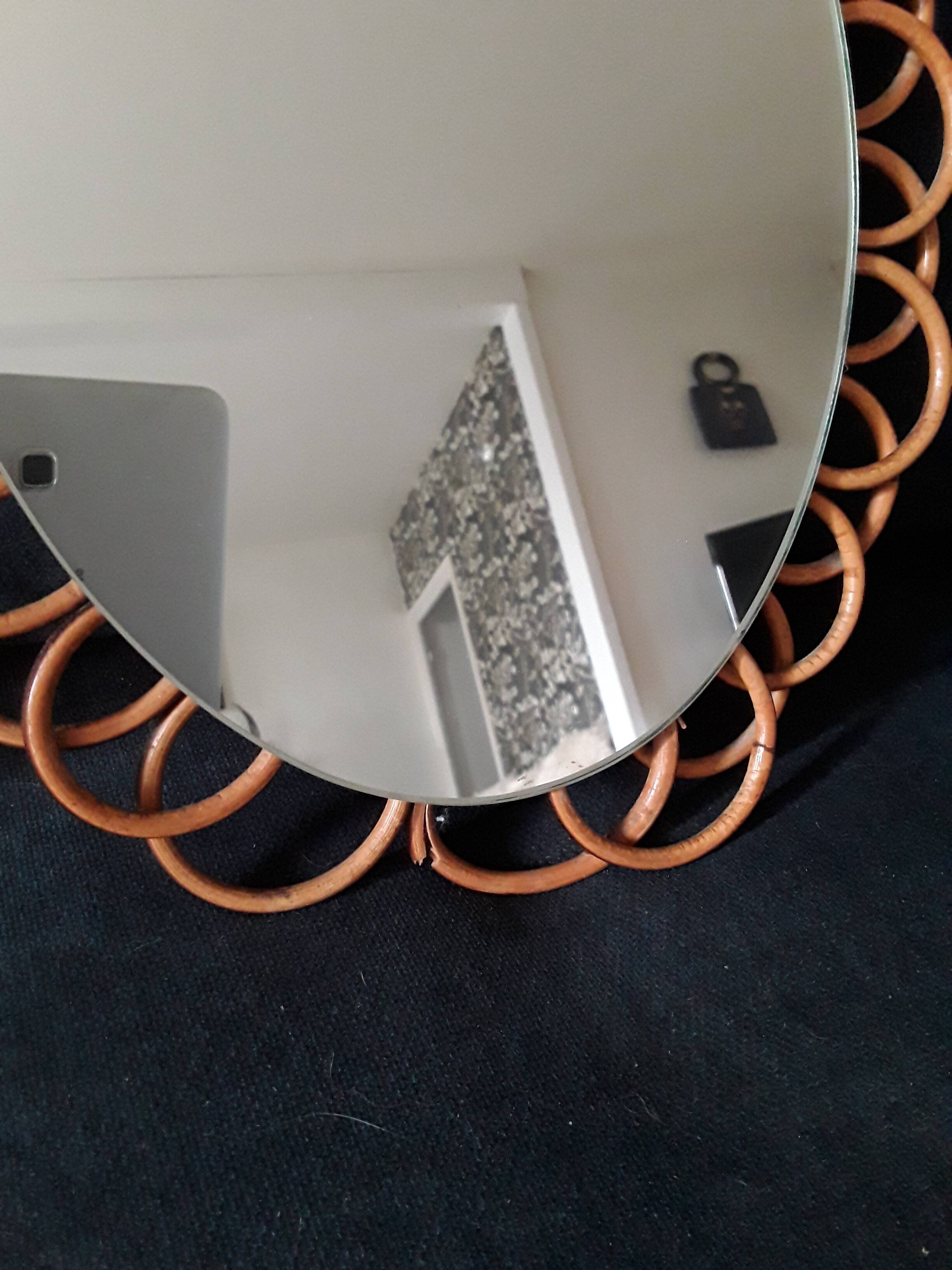 Miroir marguerite vintage en rotin