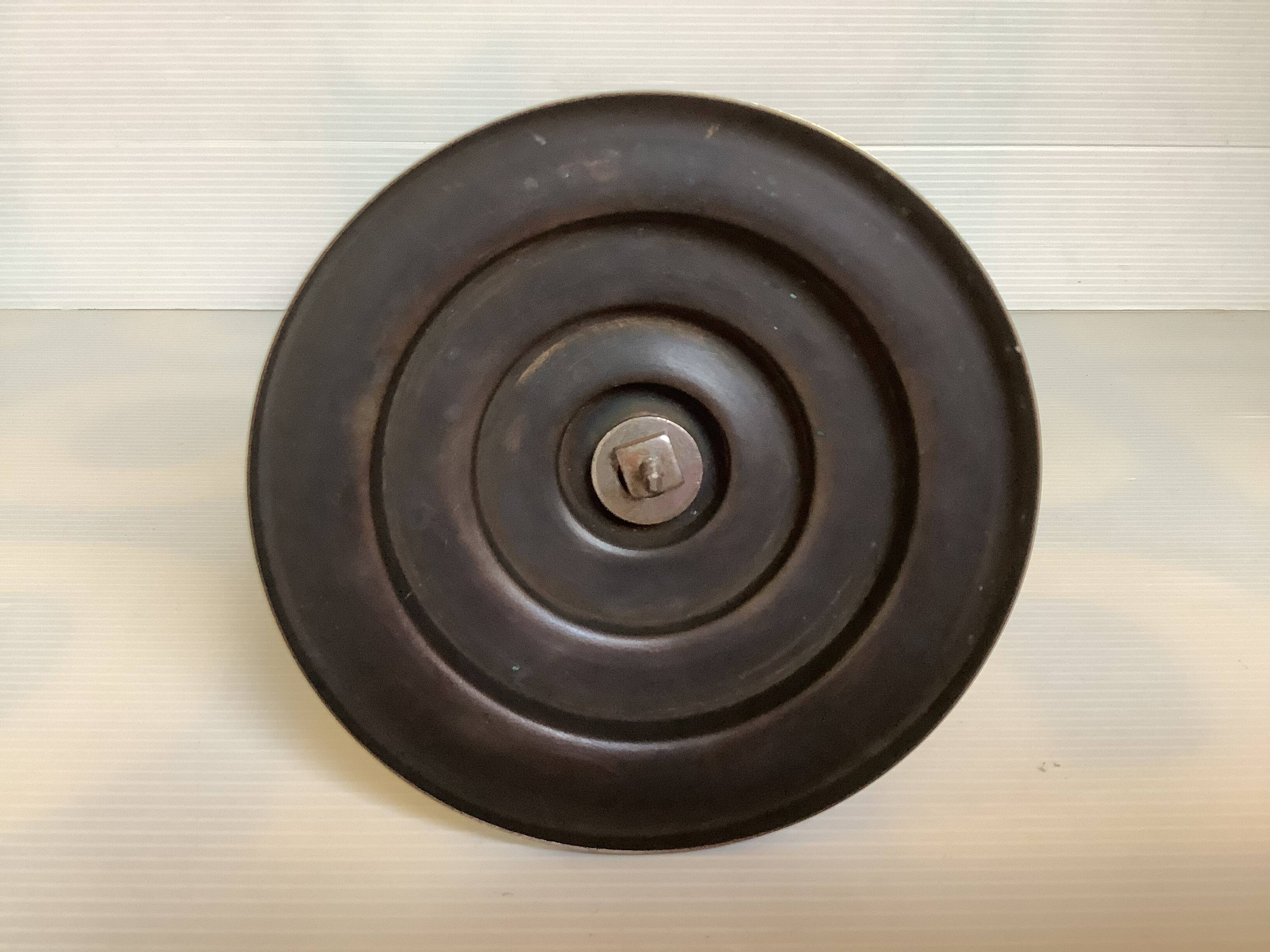 Candle holders in the shape of art deco butterfly wings