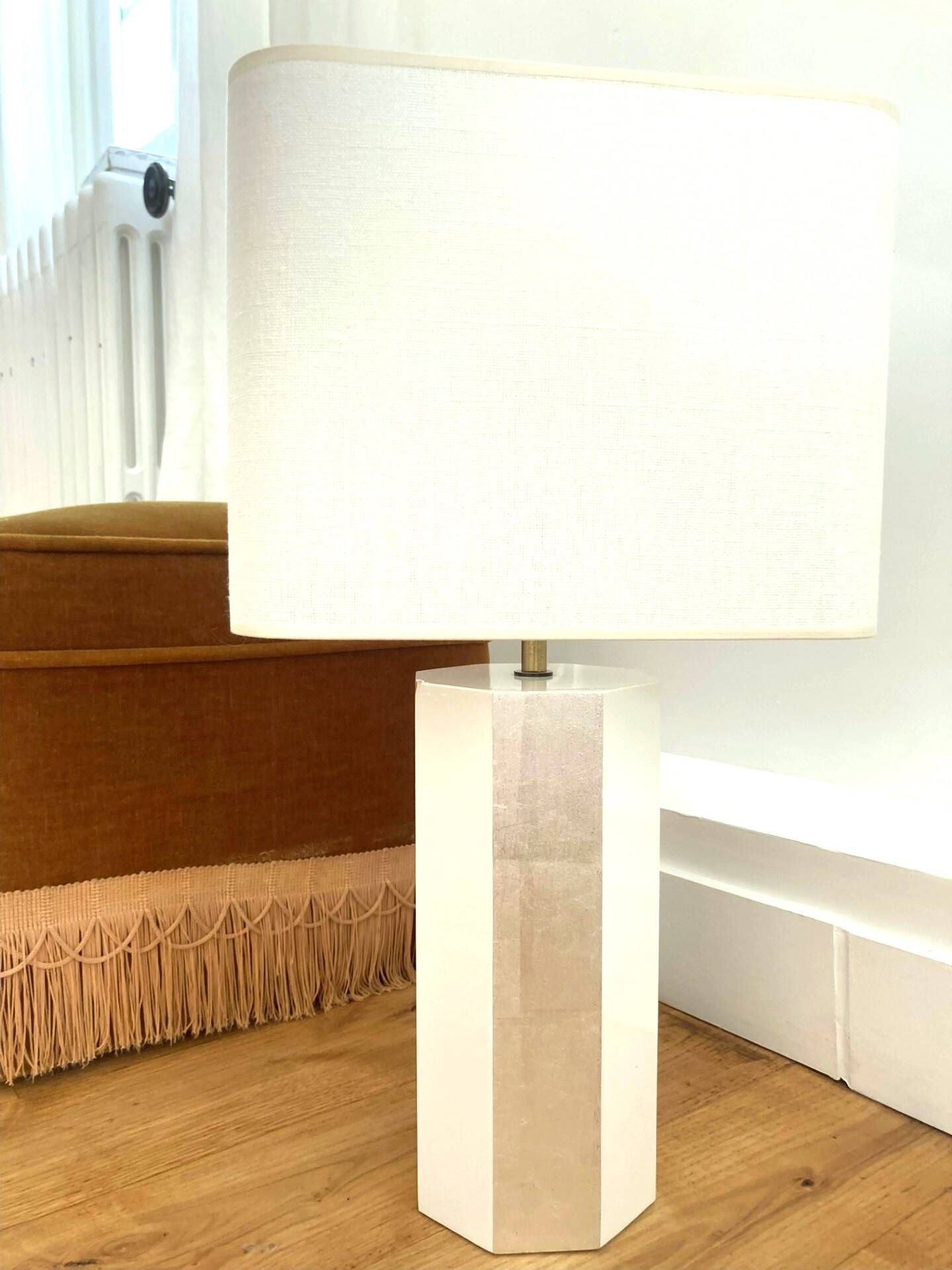 La Luco lamp in white lacquered ash and gold leaf