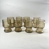 Brown water glasses decorated with citrus slices