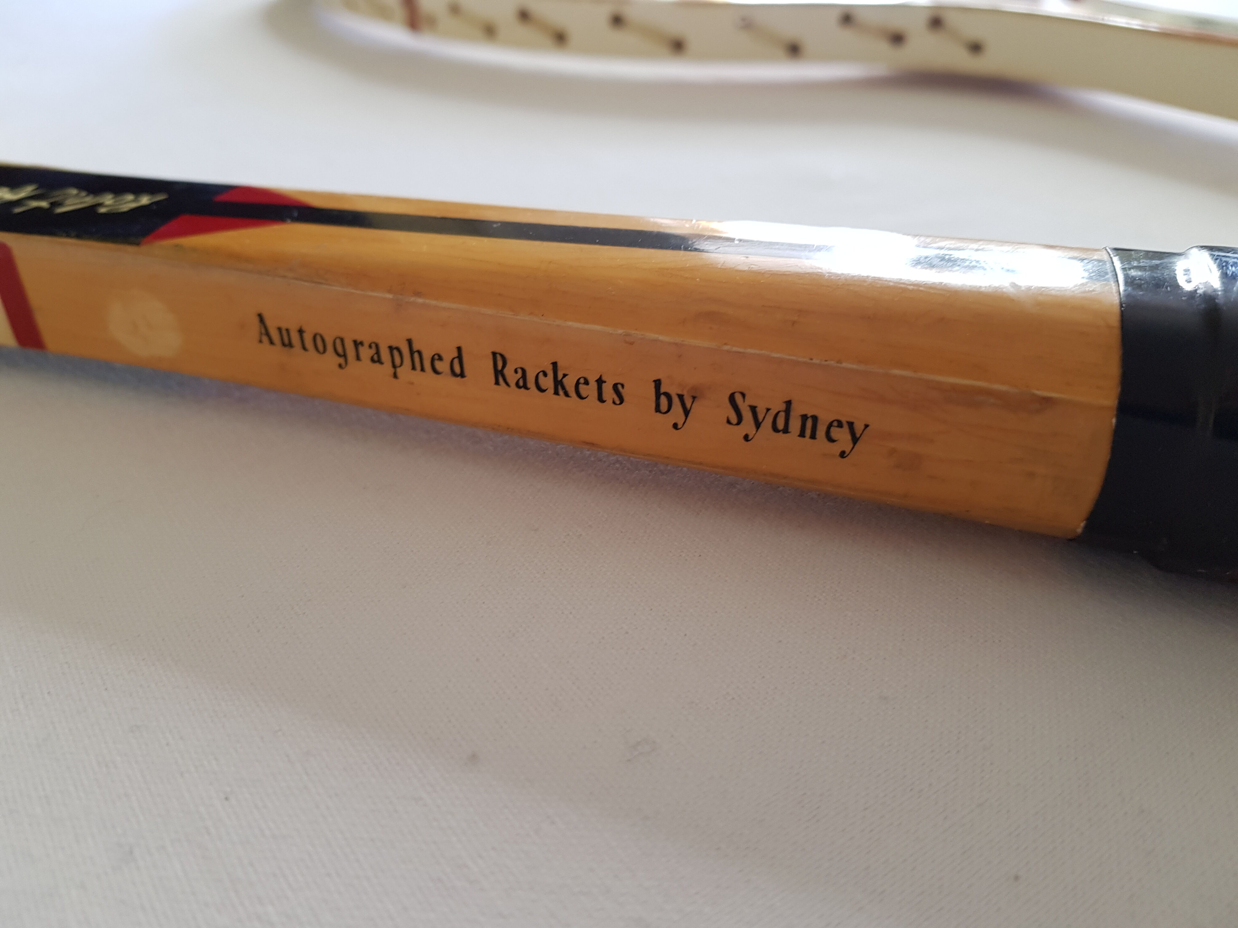 Two vintage collector tennis rackets, "Robert Haillet" and "Team de France"