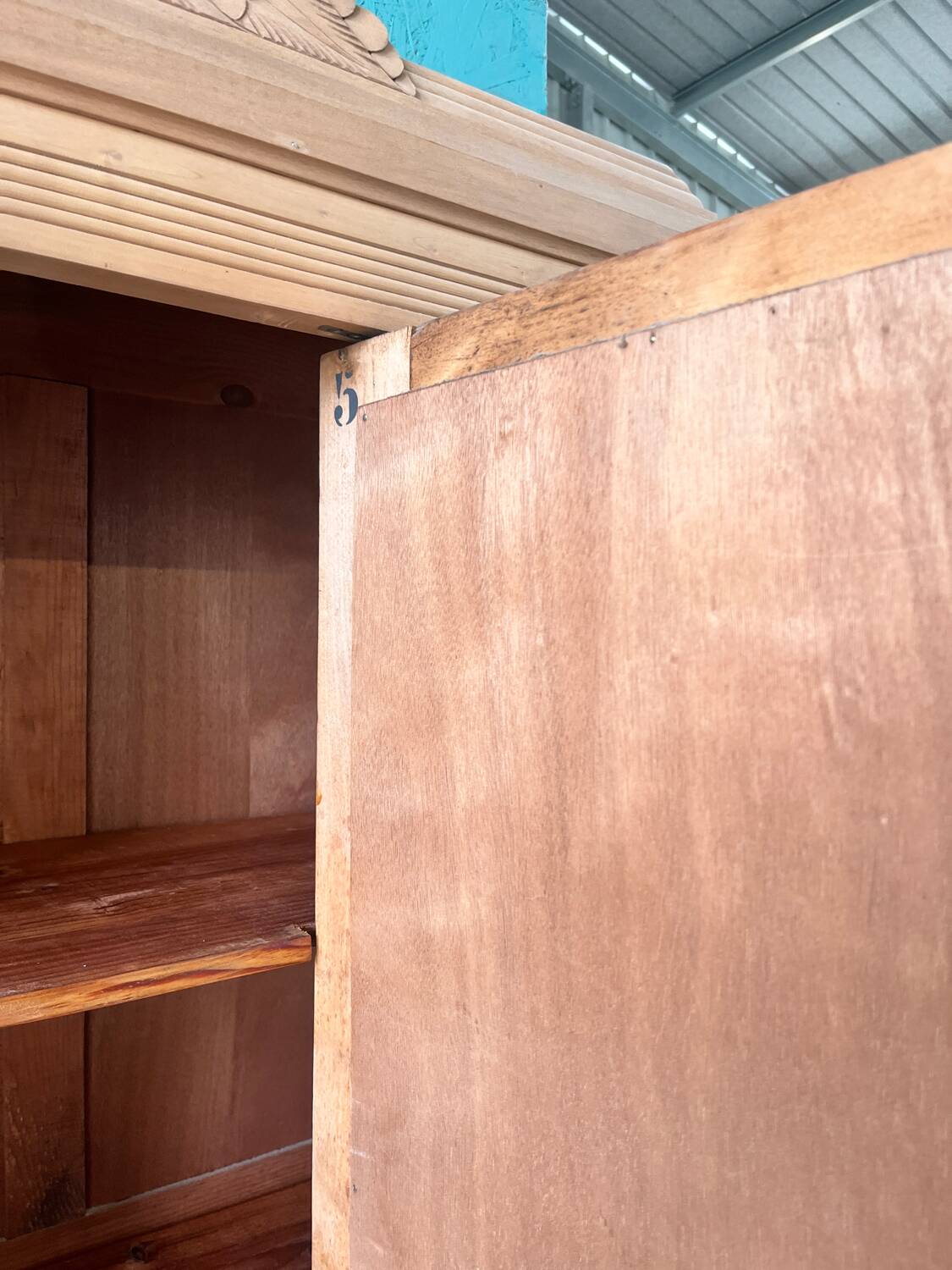 Parisian wardrobe in raw wood