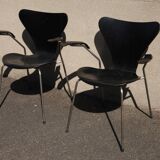 Pair of Jacobsen black Series 7 chairs with armrests
