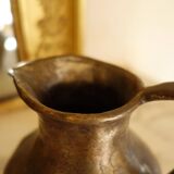 Old solid metal pitcher