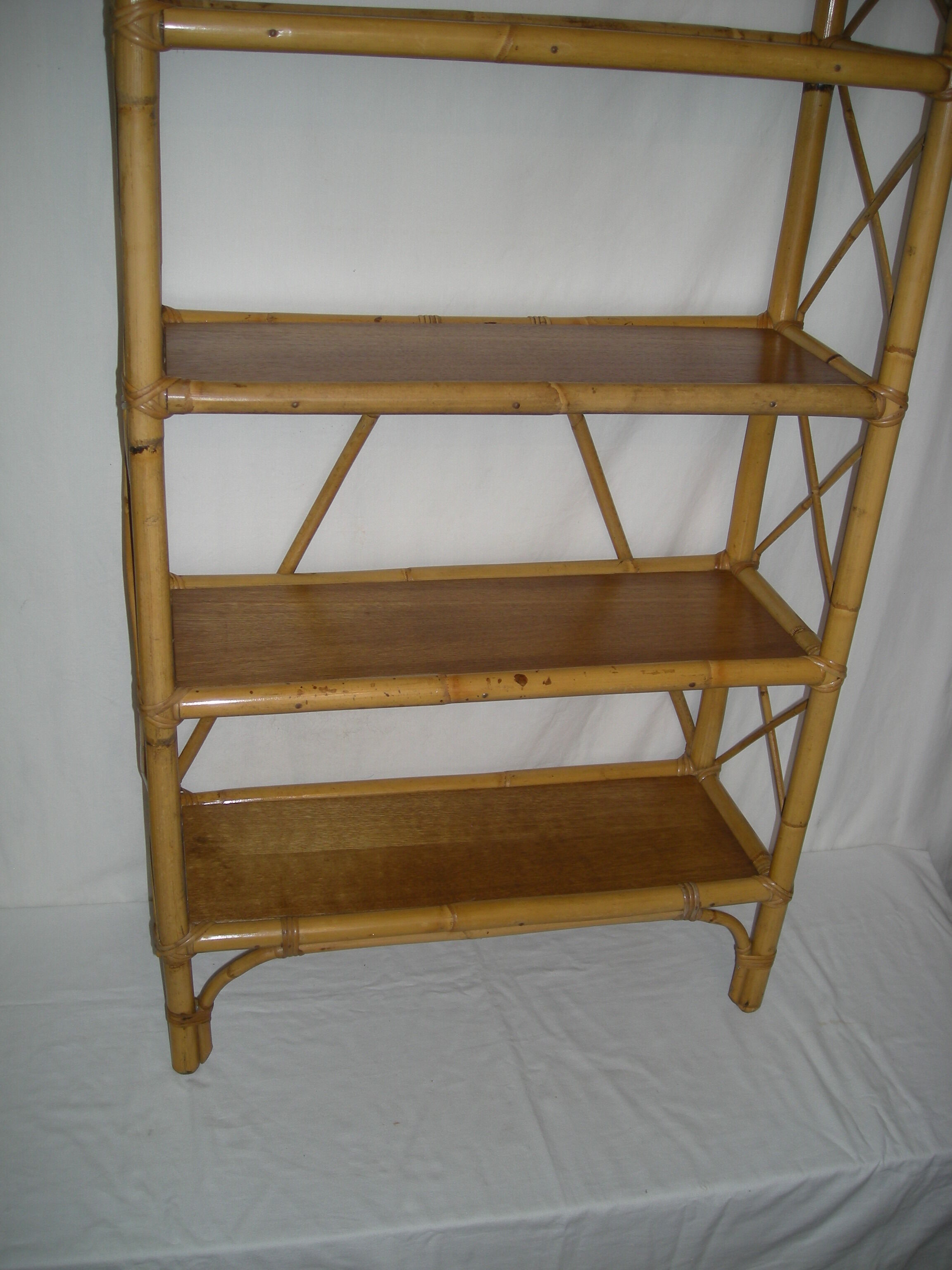 Rattan bamboo shelf on feet from the 50s 60s