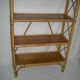 Rattan bamboo shelf on feet from the 50s 60s