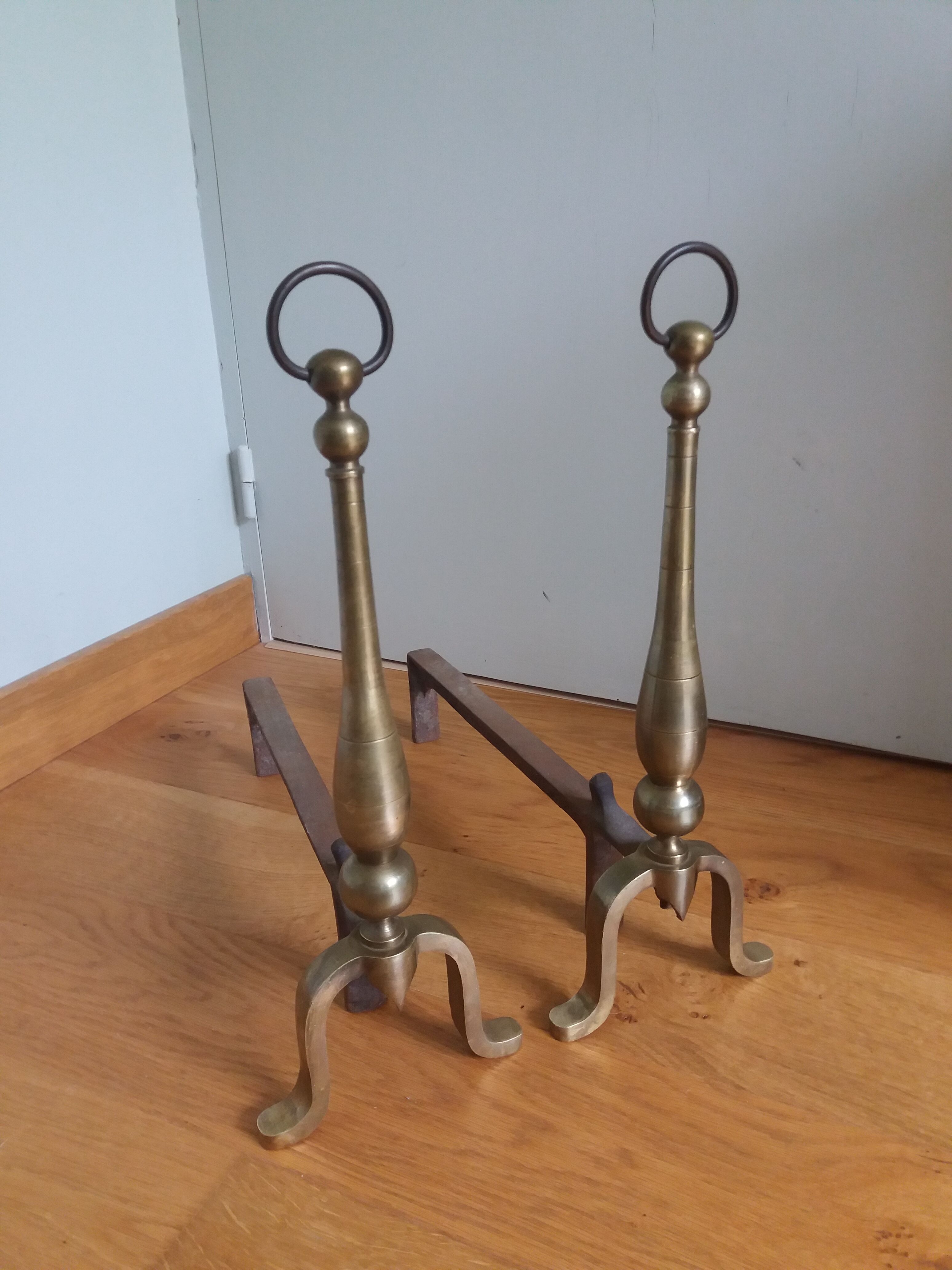 Brass or bronze andirons