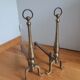 Brass or bronze andirons