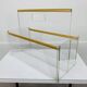 Plexiglass and brass magazine rack from the 70s in Hollywood Regency style.