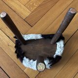 Small tripod stool in cowhide
