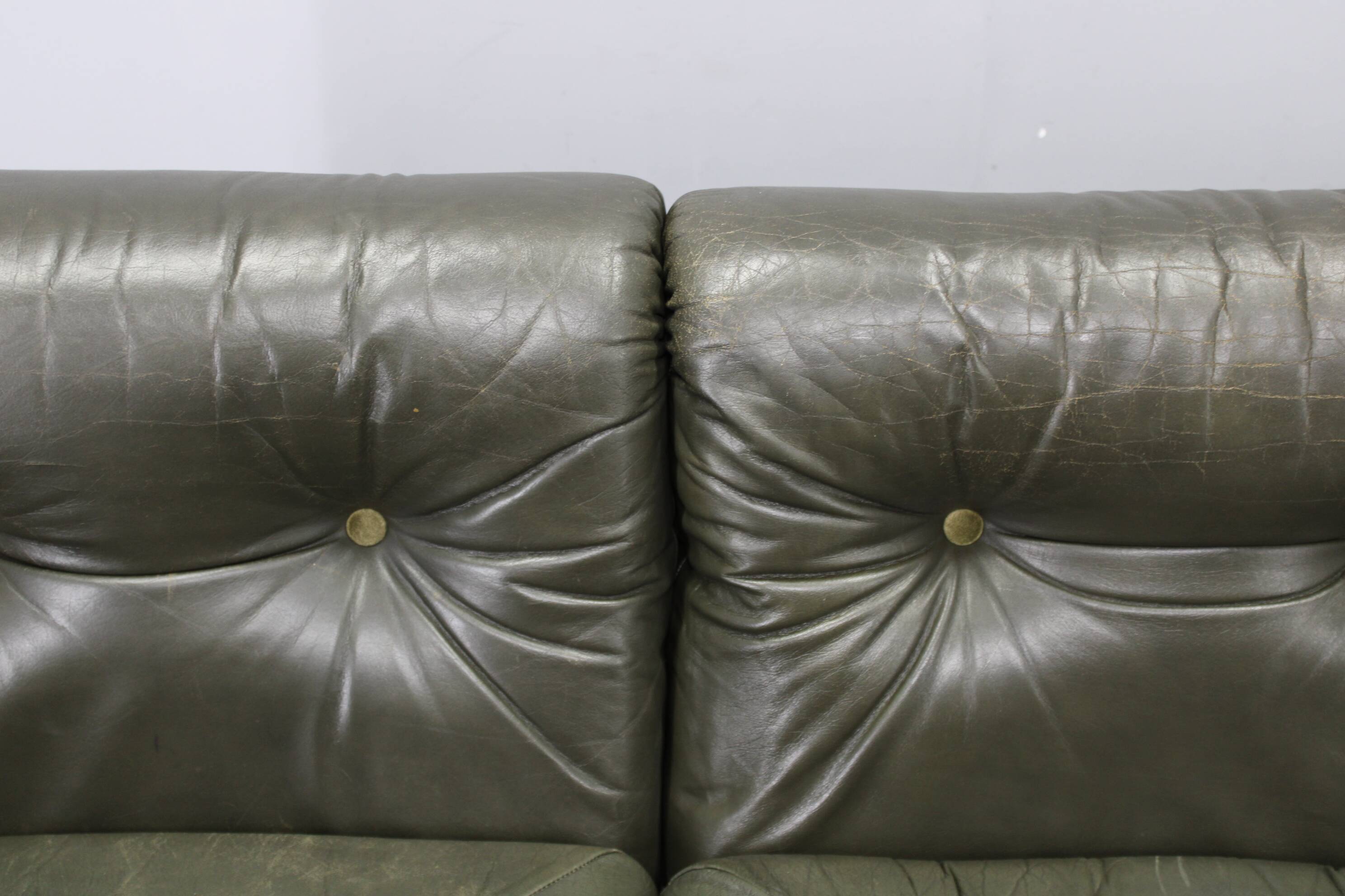 Mid-century Czechoslovak green leather sofa, 1970s