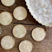Lot of mother-of-pearl aperitif items, 7 coasters and a dish.