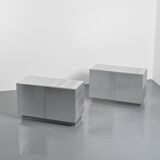 Pair of low buffets in brushed metal, French work, 1970s.