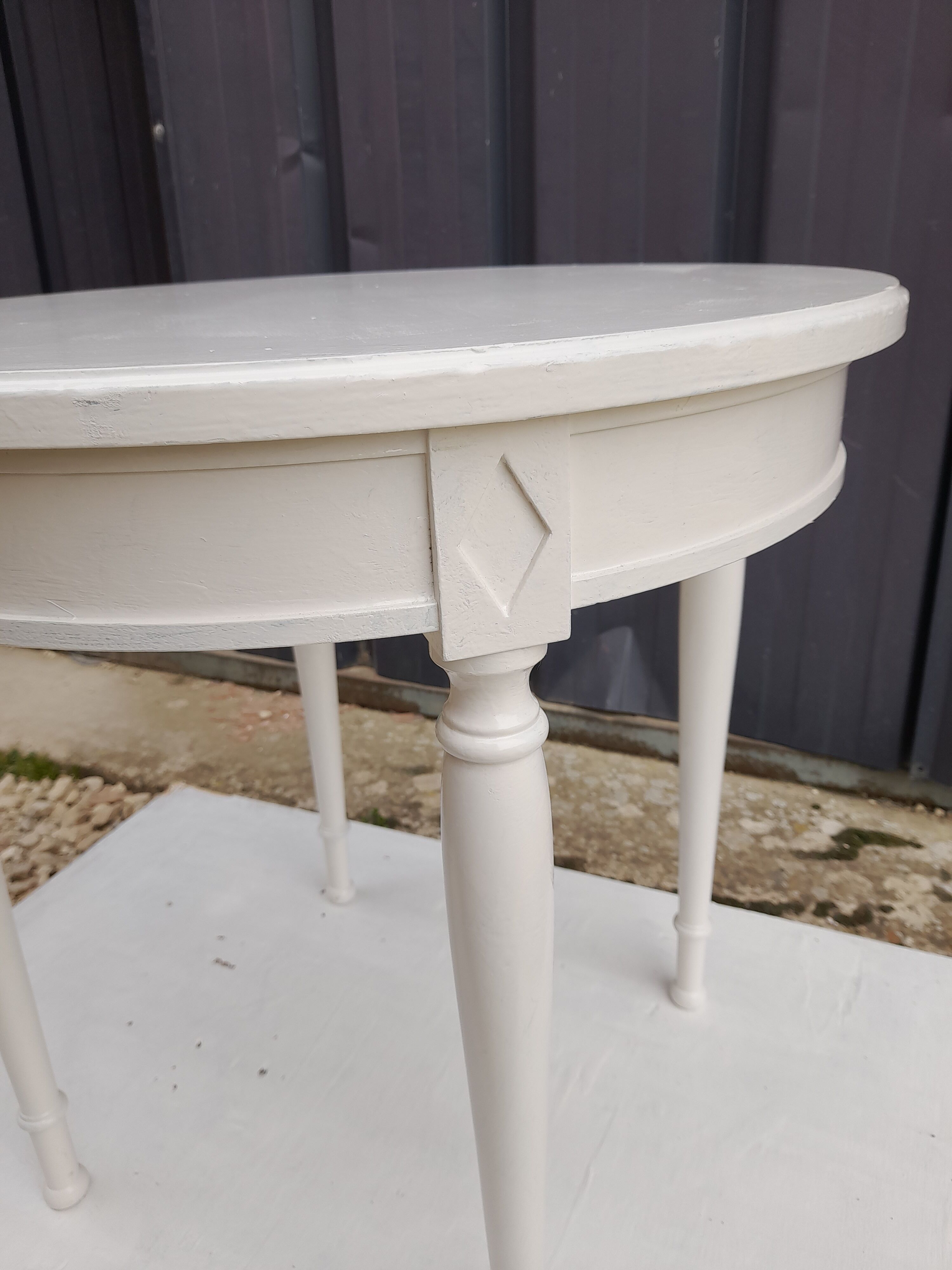 Side table in chestnut painted white