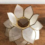 Lotus flowers in mother-of-pearl sconces