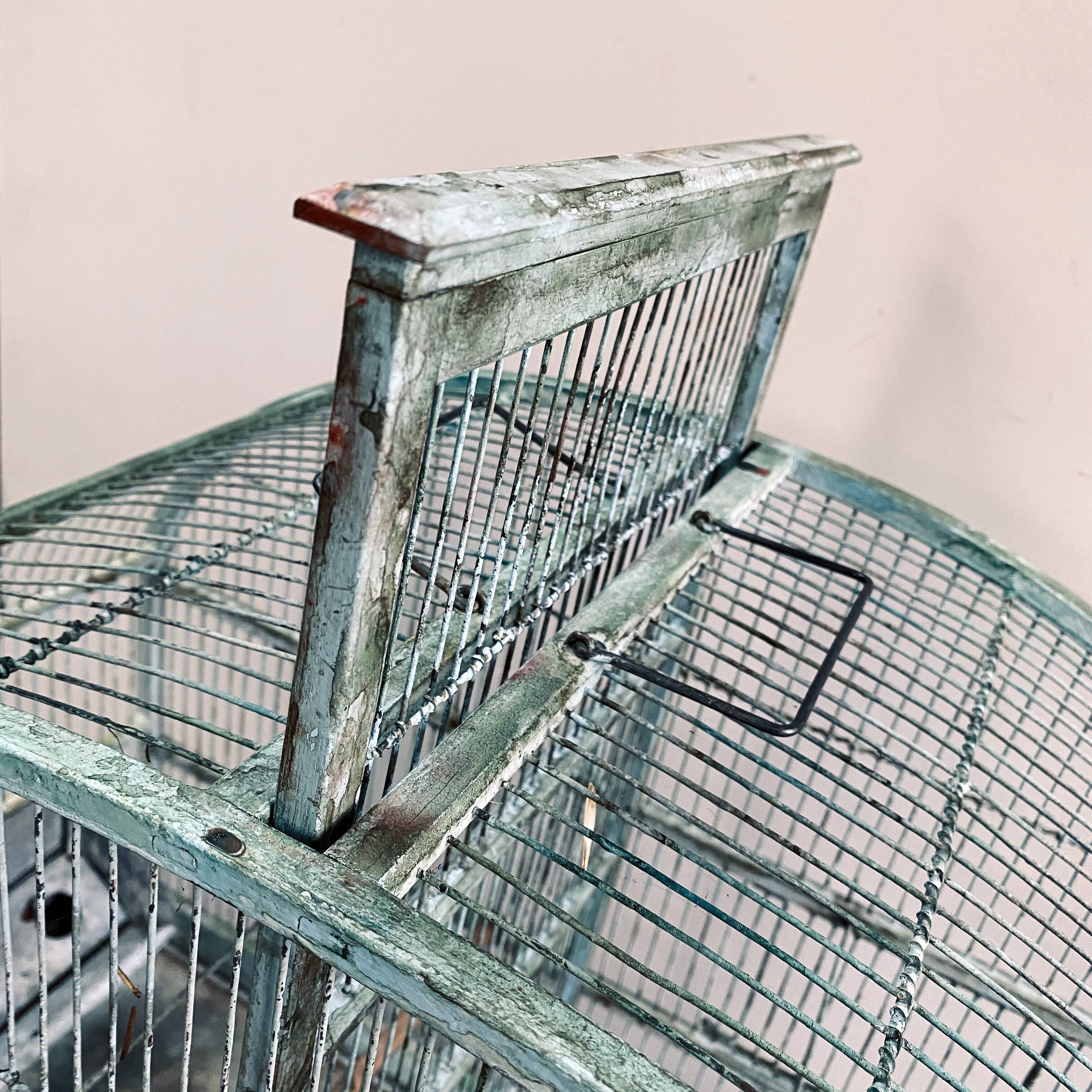 Water green patinated metal cage