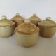 Covered tea bowls in CNP Village sandstone