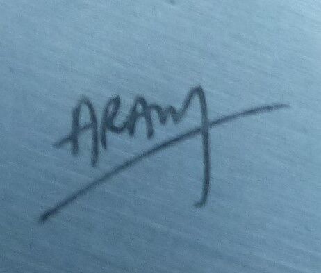 Metal vase signed ARAM