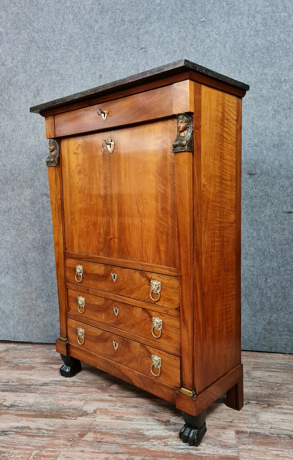 Secretary empire era with caryatid in blond mahogany around 1810