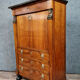 Secretary empire era with caryatid in blond mahogany around 1810