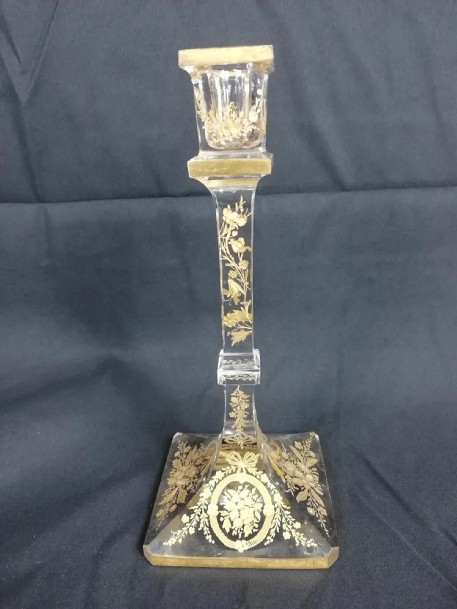 Antique glass candle holder, engraved and gilded.