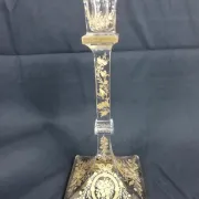 Antique glass candle holder, engraved and gilded.