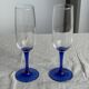 Set of 6 blue-footed champagne flutes; 3 pairs of designs.