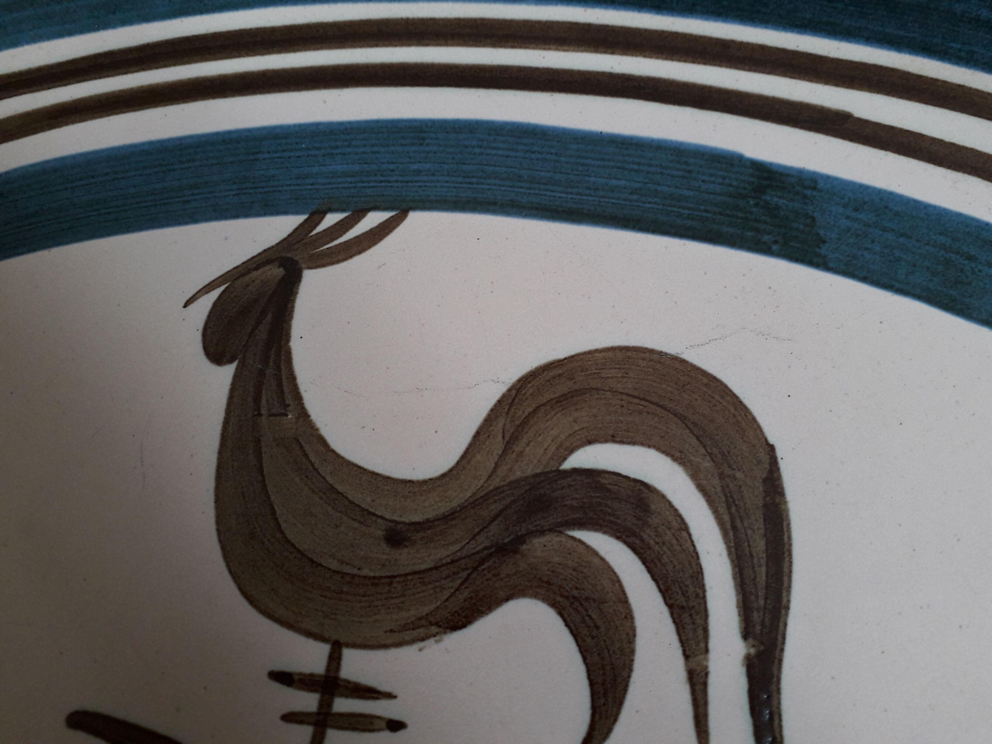 Longchamp sandstone dish with 70s rooster decorations