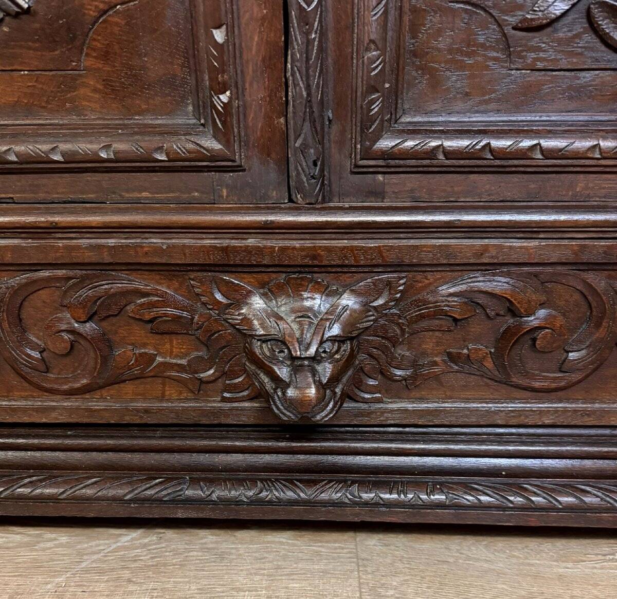 Renaissance style hunting lodge library in carved oak circa