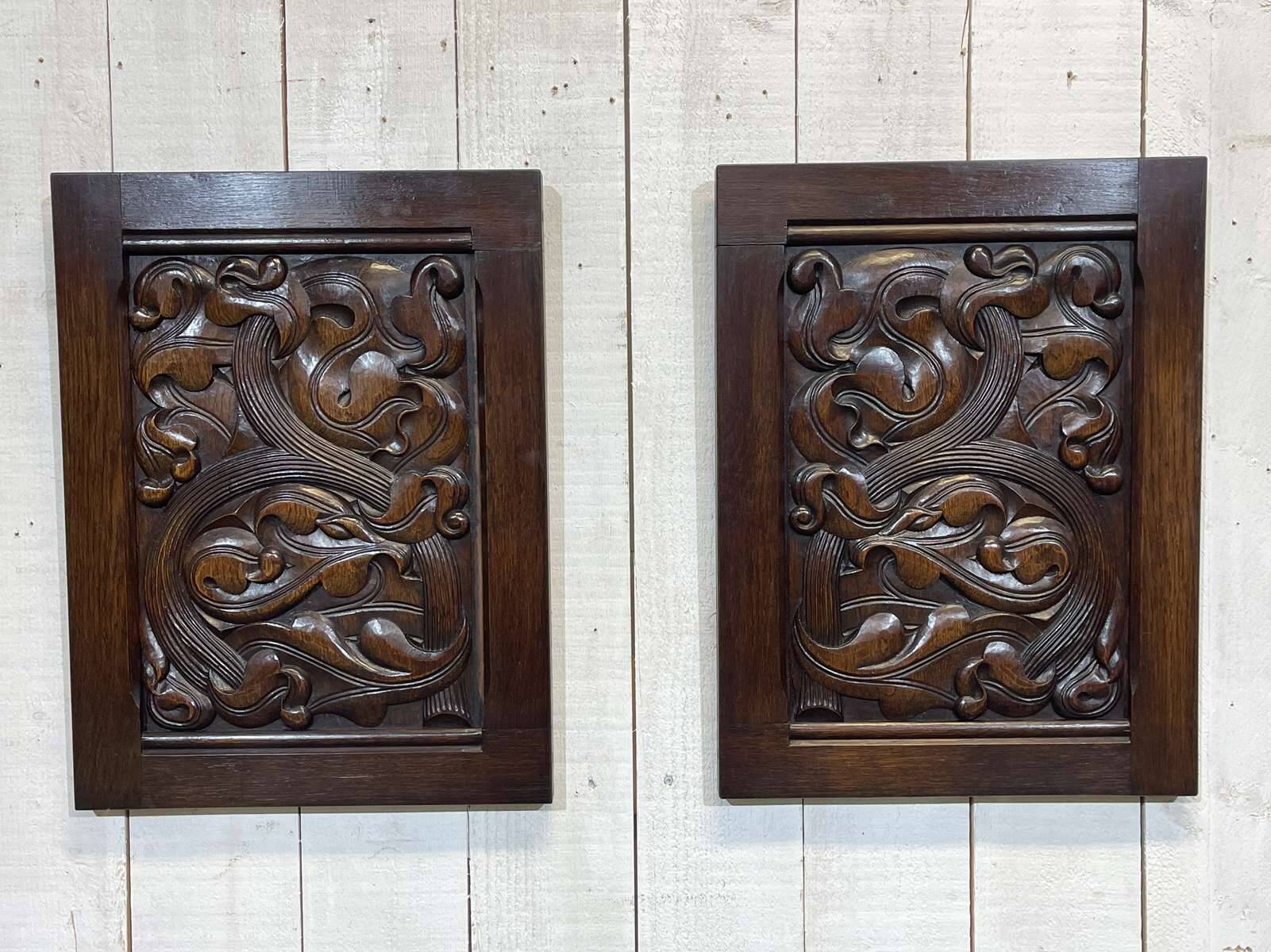 Pair of carved oak panels by Joseph Savina (1901-1983)