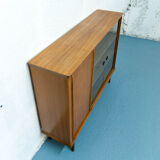 Console with sliding doors