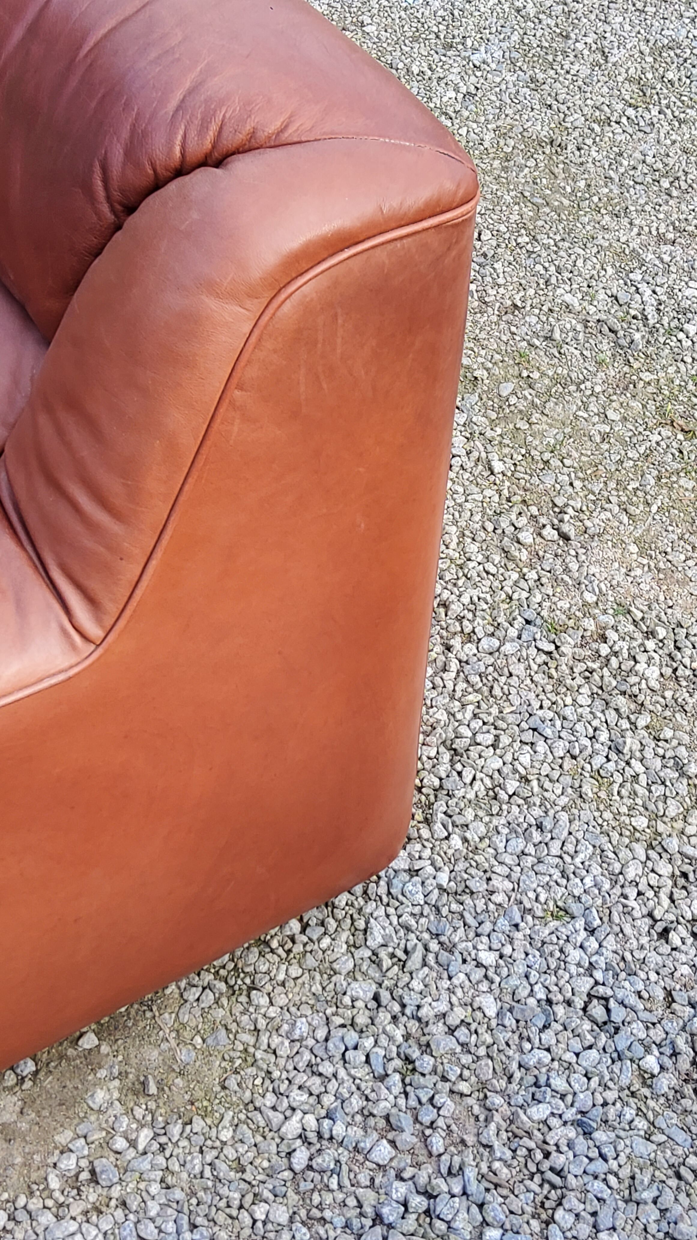 Pair of armchairs and De Sede sofa in cognac leather from the 70s/80s